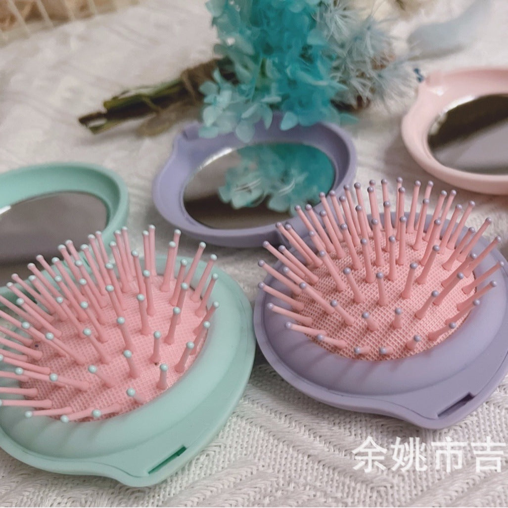 Macaron color cross -border hot -selling cartoon can fold the mini mirror combed mirror combine love